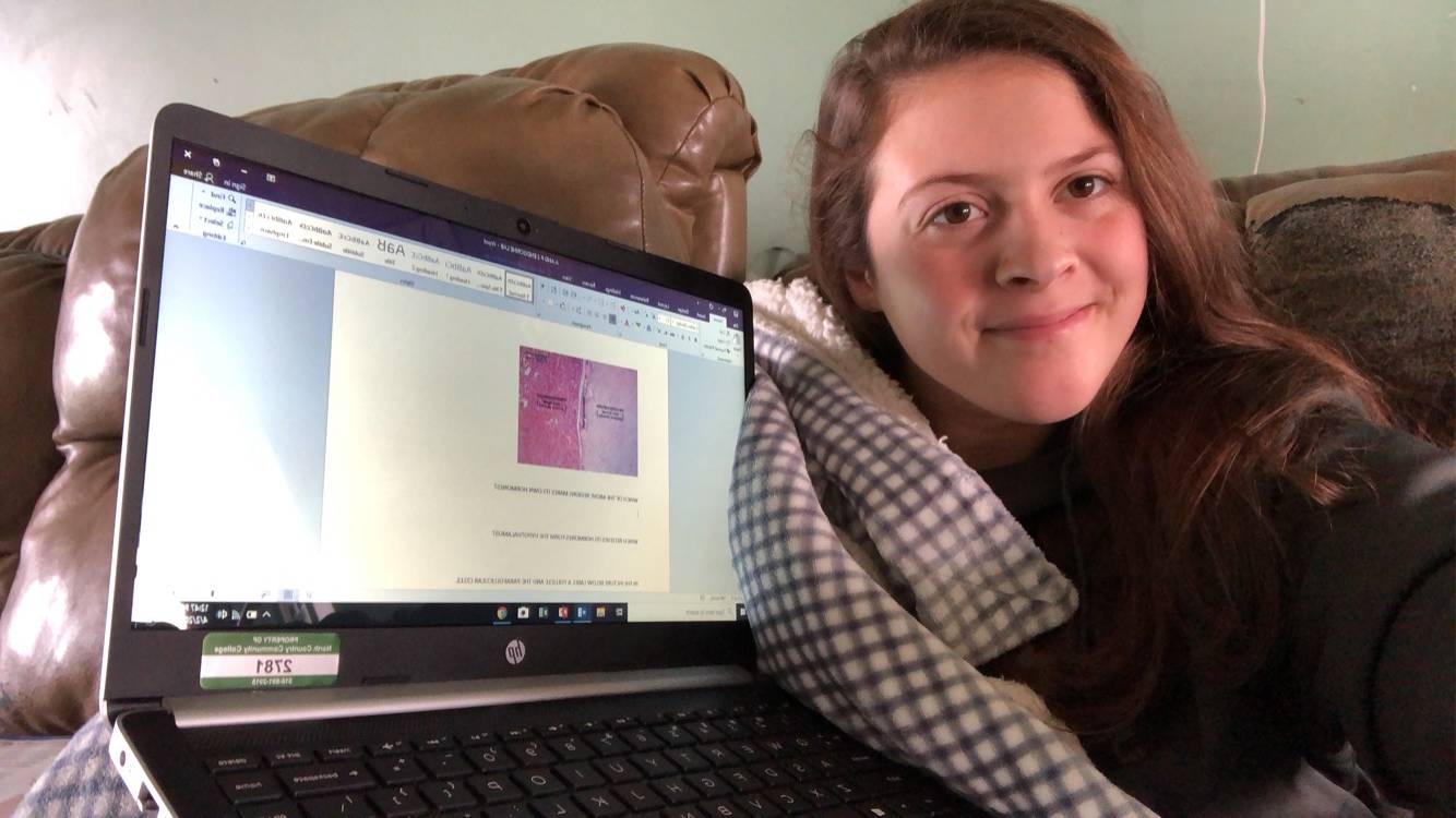 Alexis Poirier of Malone is taking online classes at home during the COVID-19 pandemic