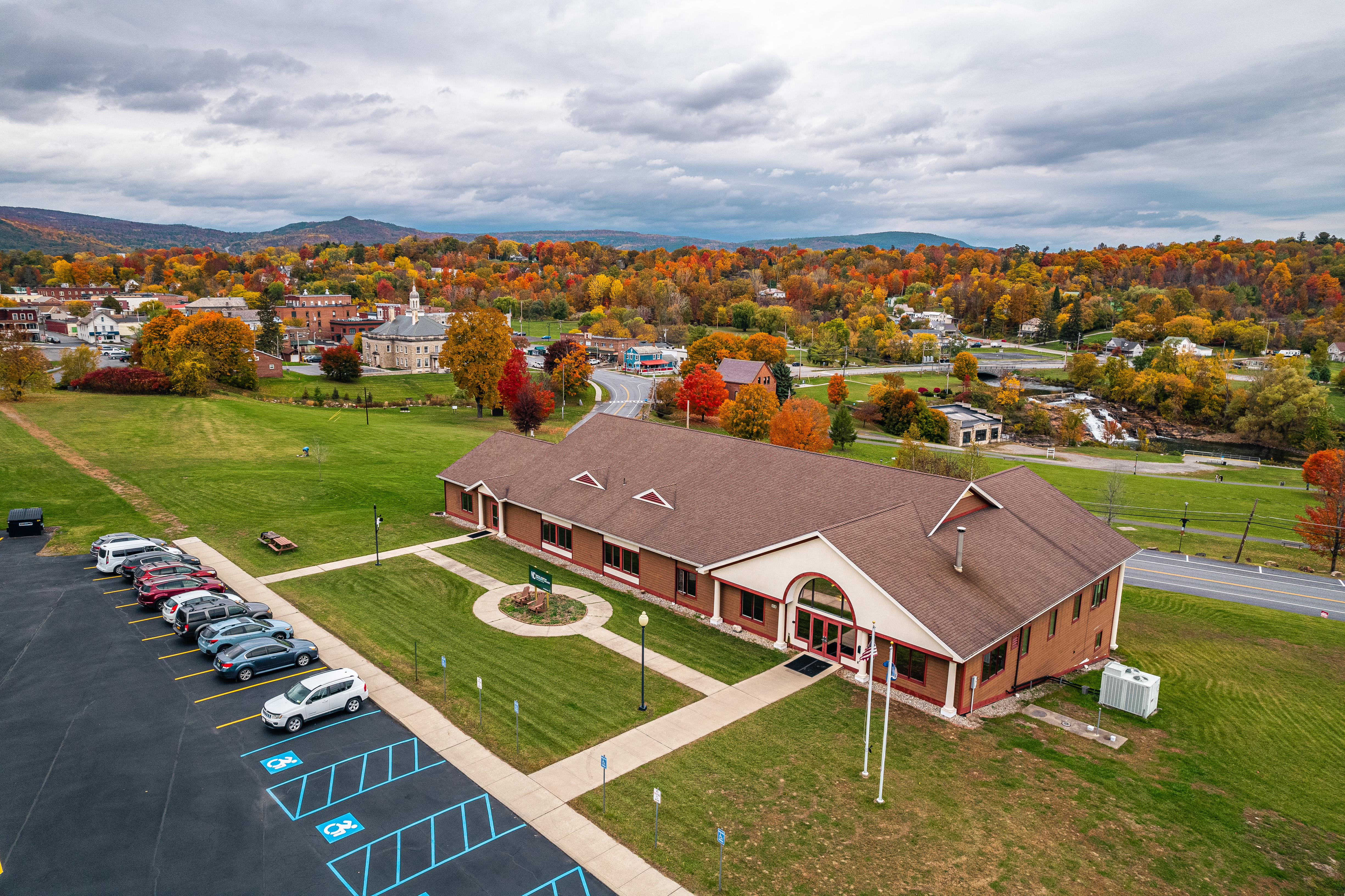 An aerial view of the Ticonderoga campus building in the fall