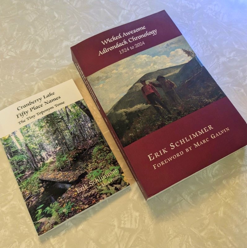 A pair of books rest on a table