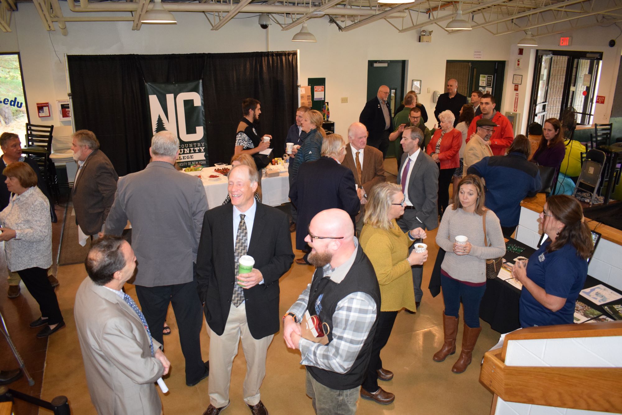 Attendees gather in the Connector, on the Saranac Lake campus of North Country Community College, for Community Leaders Day on Wednesday, Oct. 11. 