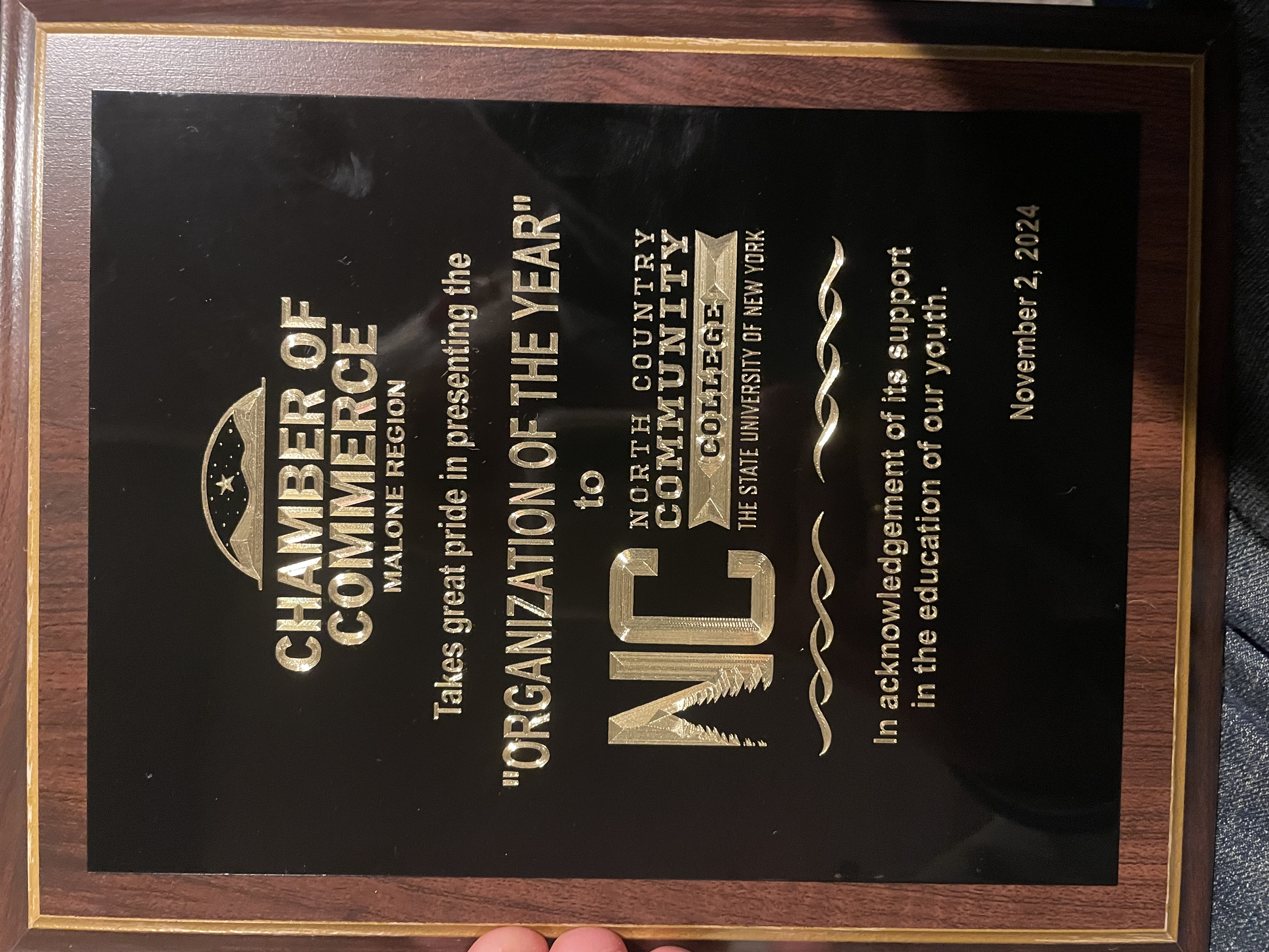 A plaque recognizing NCCC as the Organization of the Year