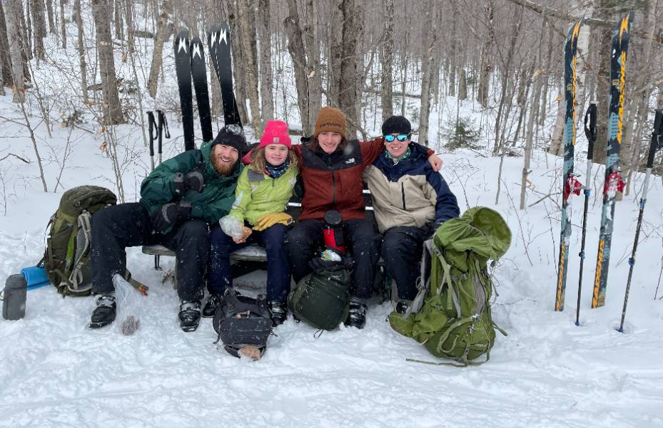 Learning to make turns on backcountry skis at the Adirondack Mountain Club’s ski slope at Heart Lake. Left to right: Nate, Abby, Jeremy, Sam 