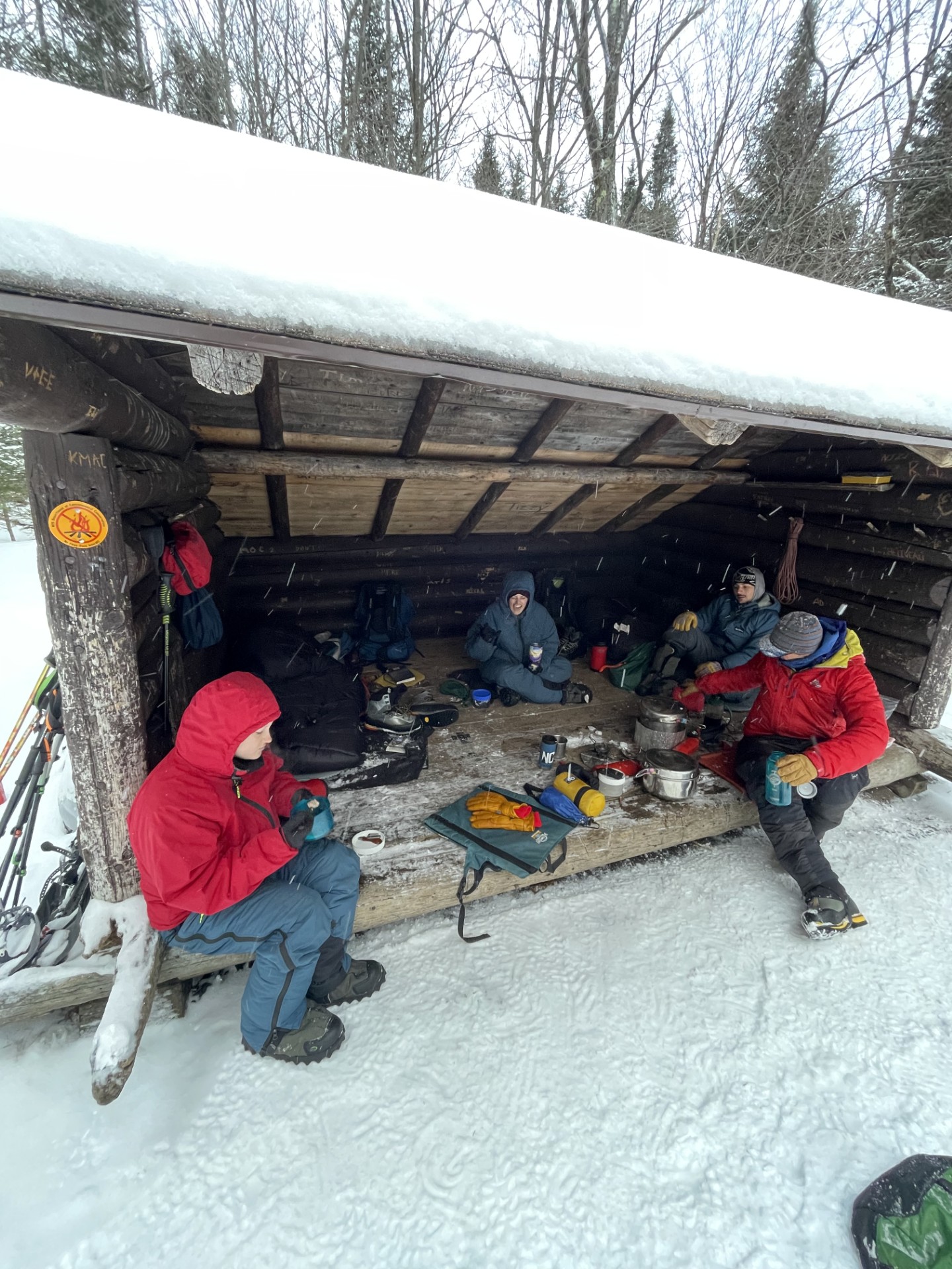 Students in the WRL program work at a lean-to in the Adirondack backcountry